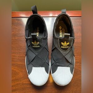 Adidas Women’s Black and White Slip-On Sneakers with Gold Leather Size 9